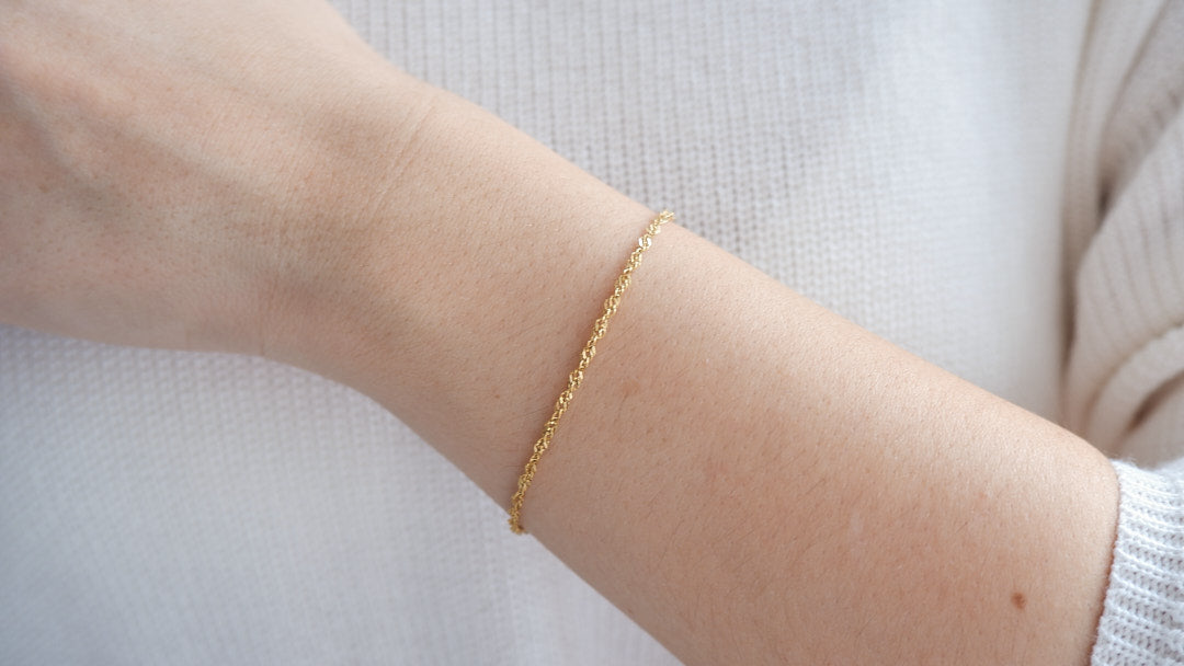 Elegance and resilience intertwine in our gold-plated and stainless steel bracelet, a versatile accessory from our curated jewellery lineup.