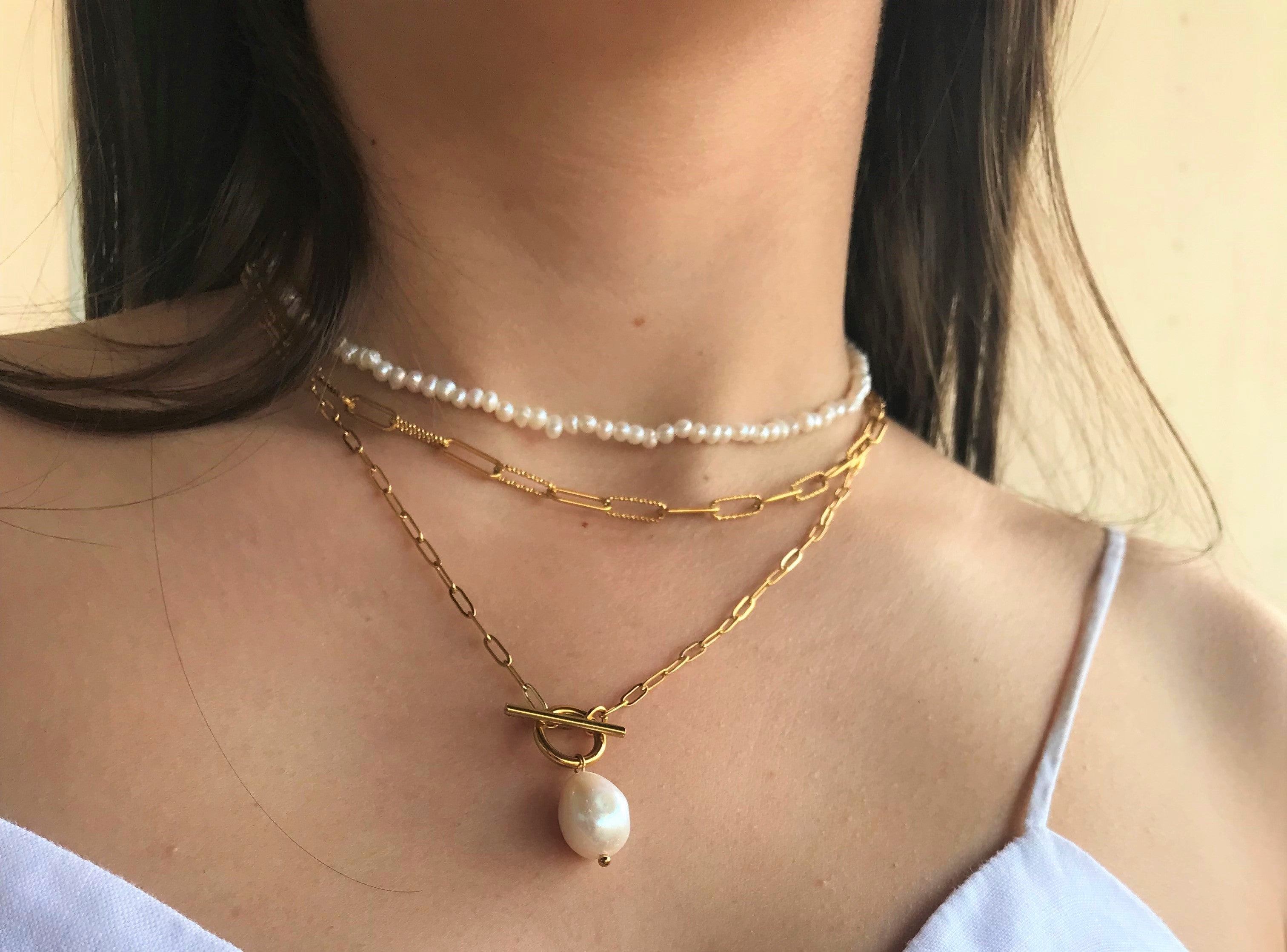 Infuse your style with elegance and versatility through our gold-plated and stainless steel necklace, a perfect blend of sophistication from our curated jewellery collection. 