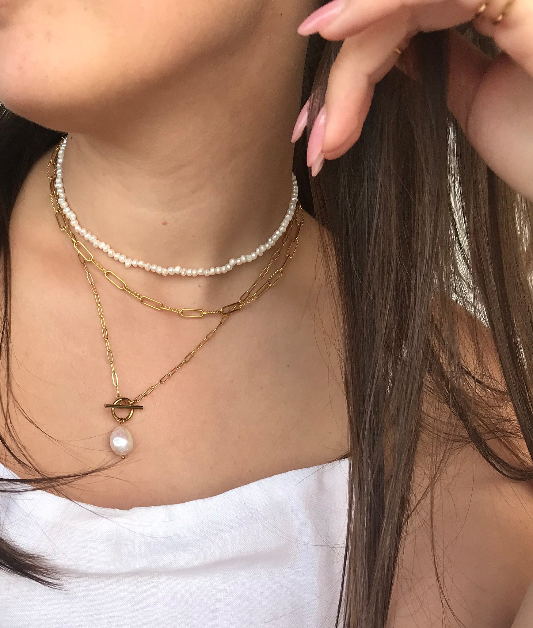 Elevate your elegance with our gold-plated and silver necklace, a chic accessory to enhance your ensemble from our captivating jewellery collection.