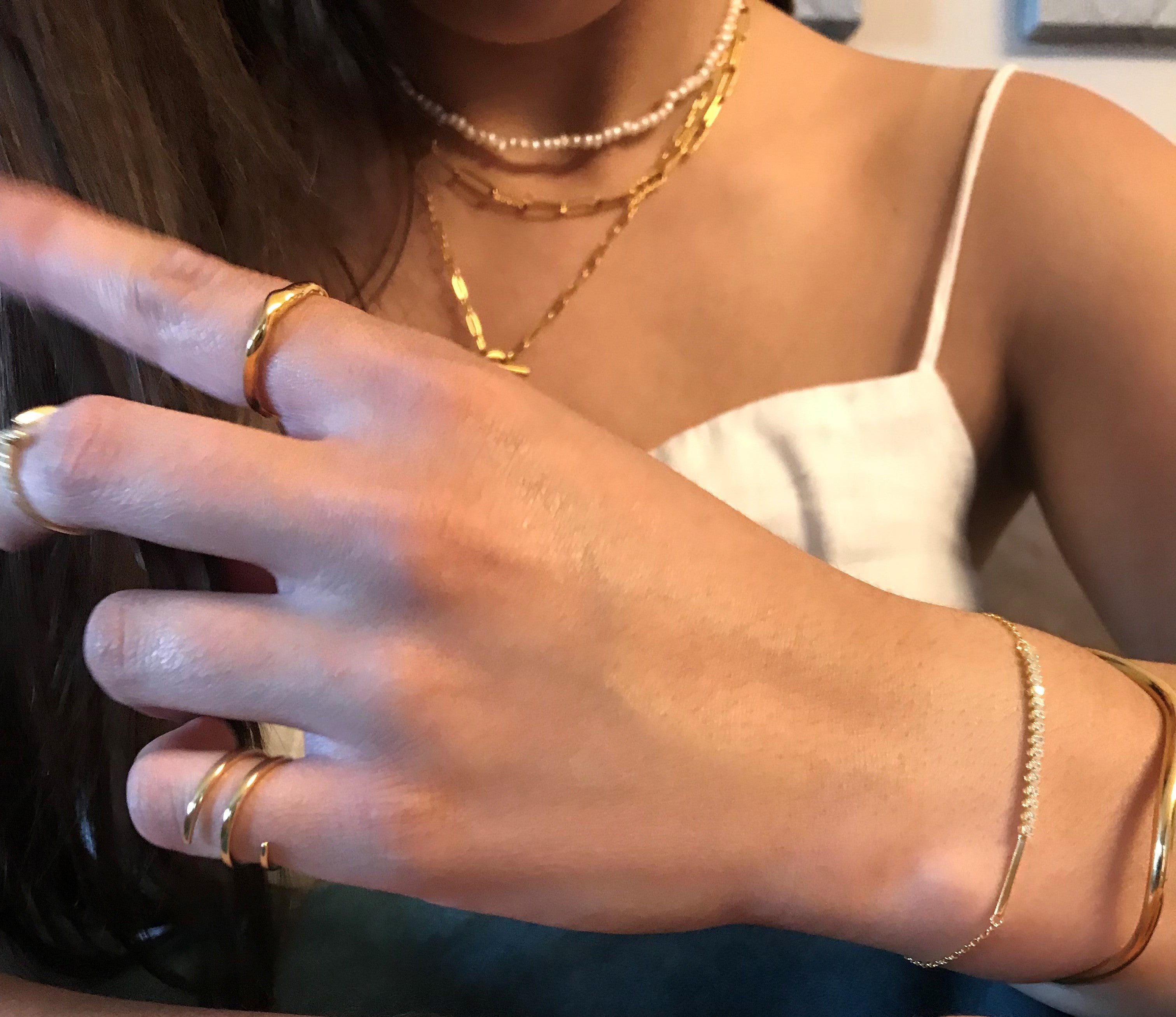 Charm and sophistication shine in our gold-plated and silver bracelet, a timeless accessory to elevate your style from our curated jewellery collection.